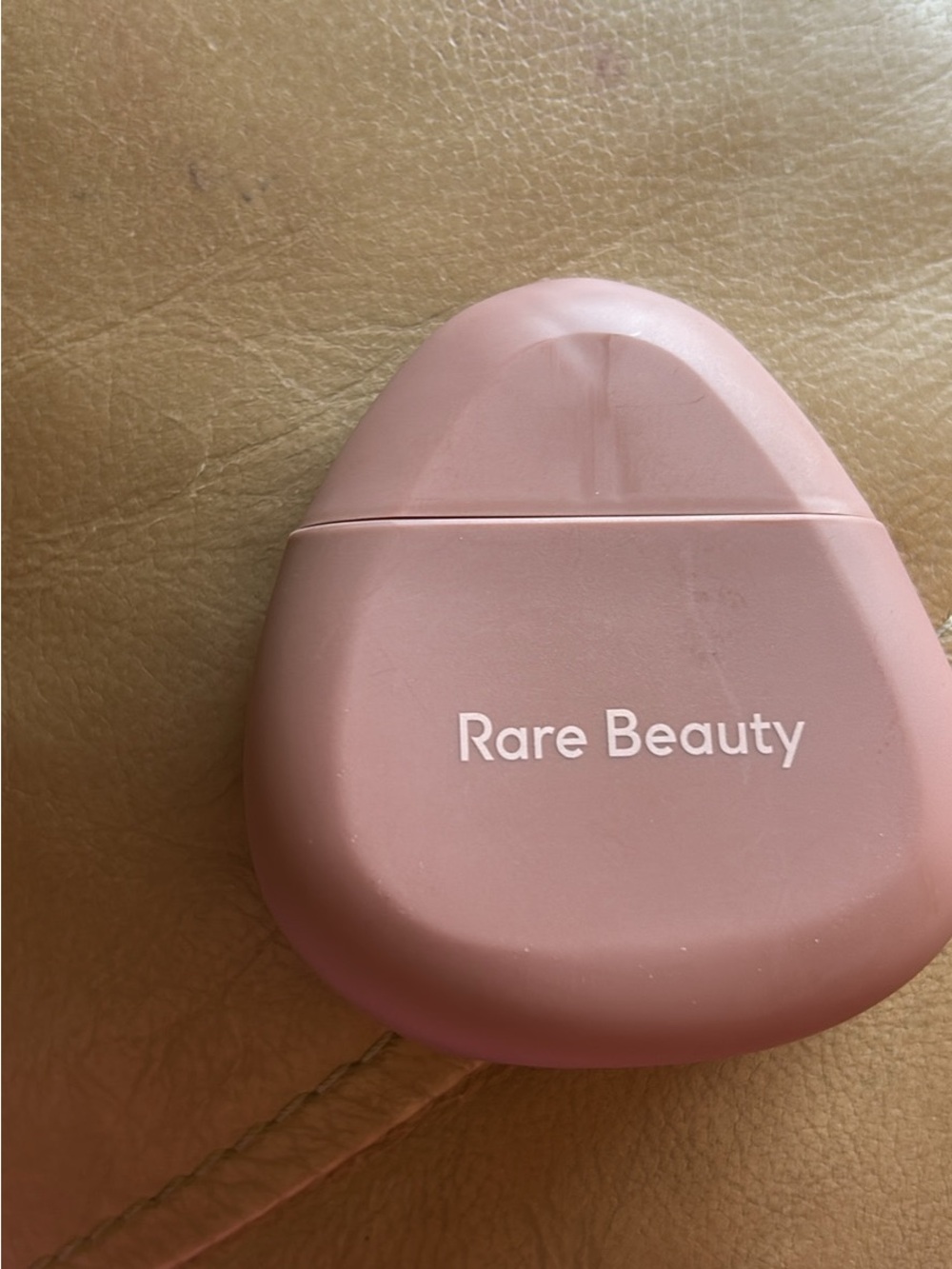 Rare Beauty blush-pink Body Moisturizer Compact